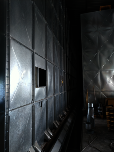 Assembly of a grain plant with rectangular storage silo