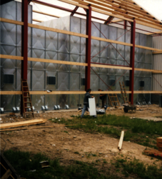 Assembly of a grain plant with rectangular storage silo